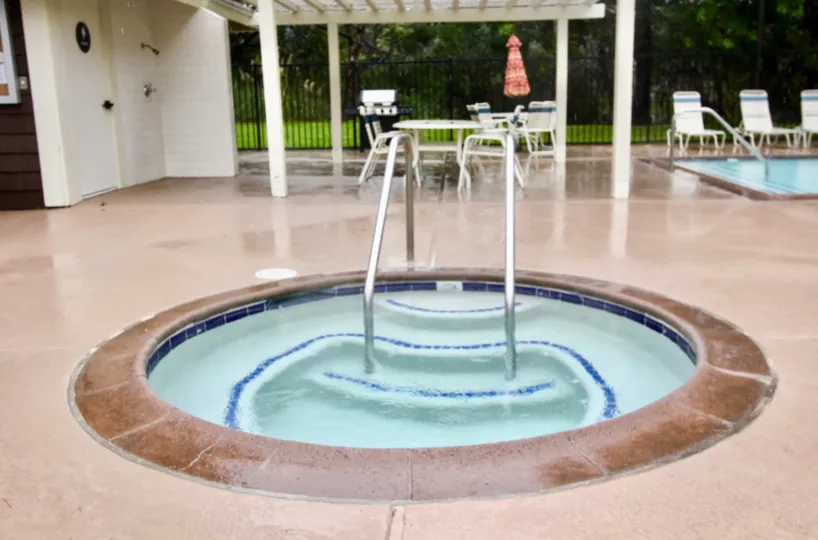 The rounded and square shaped swimming pool situated in the courtyard of Sycamore Glen.