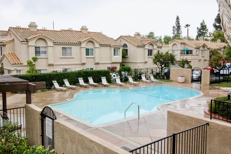 backyard pool with deckchairs at vista del flores lake forest california