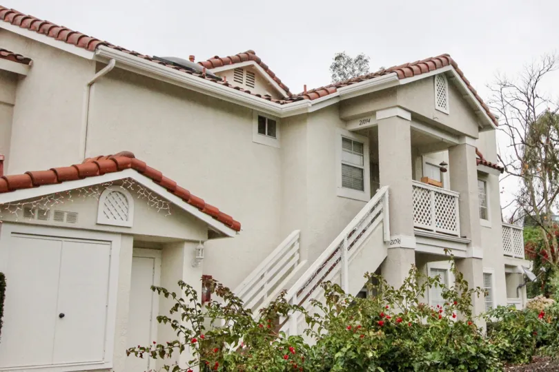 A white house with red roof in Willow Glen in Lake Forest, CA