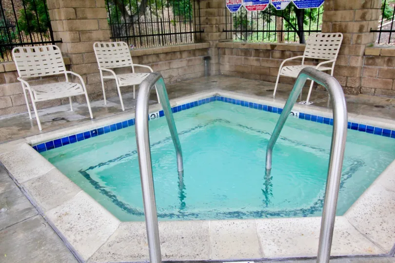 THE VILLAS IN THE ALTA FINISTERRA WITH THE SWIMMING POOL, CHAIRS