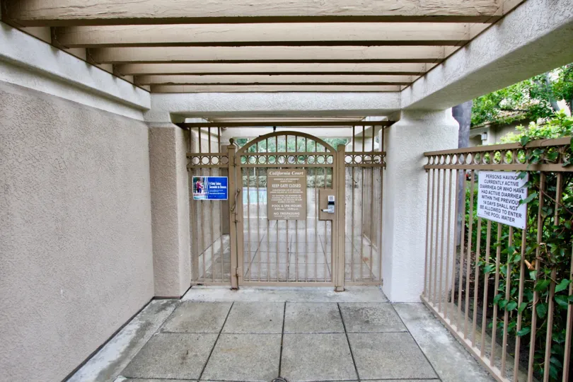 CALIFORNIA COURT Squeaky clean second story condo with a gorgeous maintain view, 2 bedrooms and 2 baths. Spacious and light living room with a fireplace and custom flooring. Terrific kitchen has granite counters and a wraparound serving bar. Stainless ste