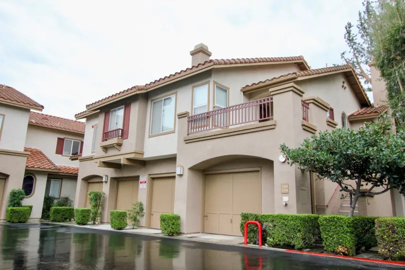 Large tan Homes with garages in California Court communtiy in Mission Viejo, California.