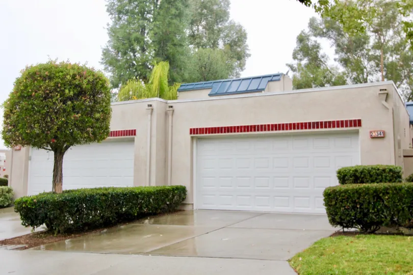 Tiled floor and front car parking with slanting roof in Cypress Point.