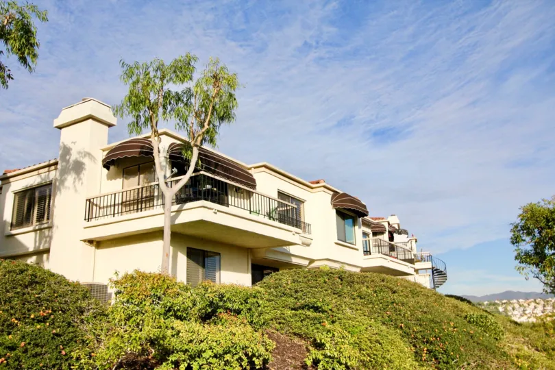 Feathery clouds over the magnificent Mallorca Condos at Mission Viejo.