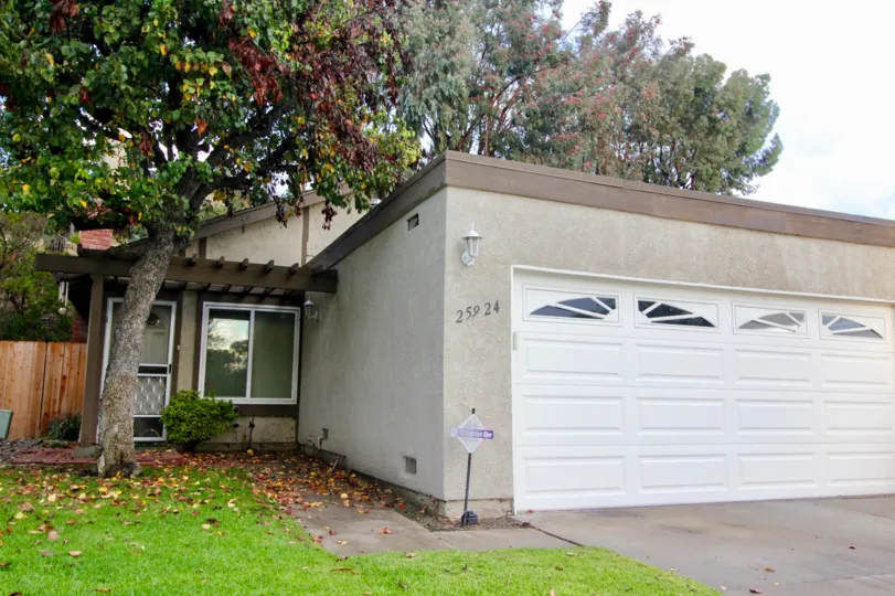 A sunny day on a small grey home in the Pheasant Hill community in Mission Viejo, California.