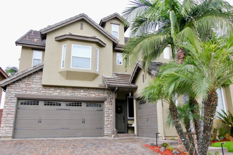 Combination of English casltle styling and spanish abobe make this communityh distinctive