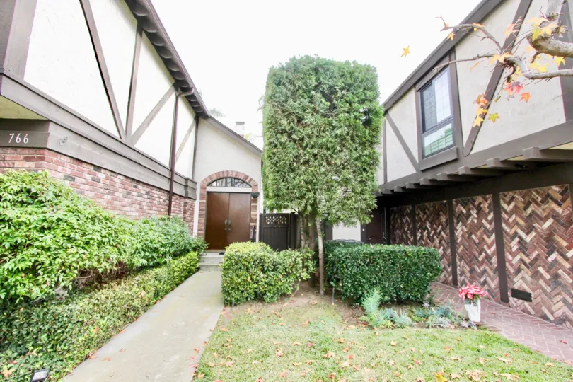THE 766 APARTMENT IN THE 16TH & TUSTIN WITH THE GRASSLAND, PLANTS, TREES