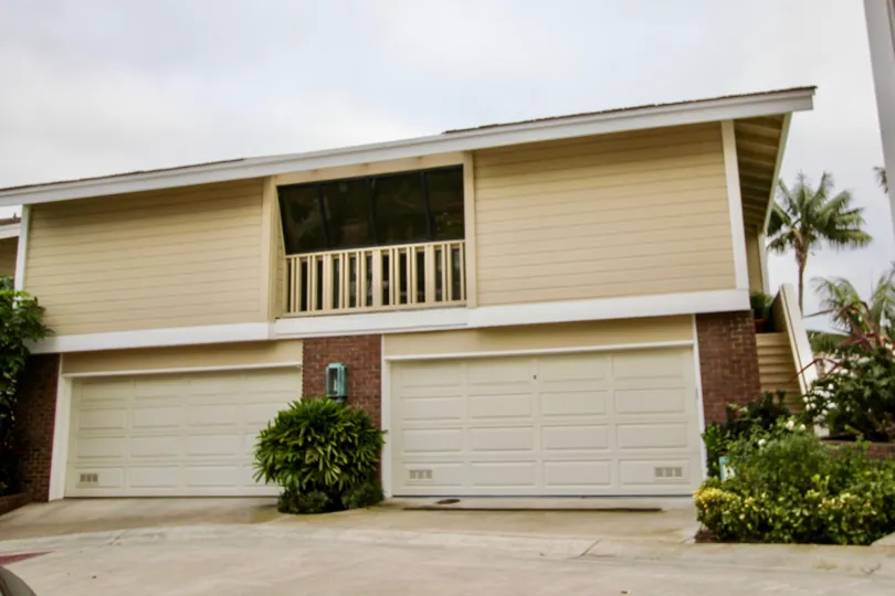 lower level houses a large rec room with wood floors in Bayside Cove with some plants