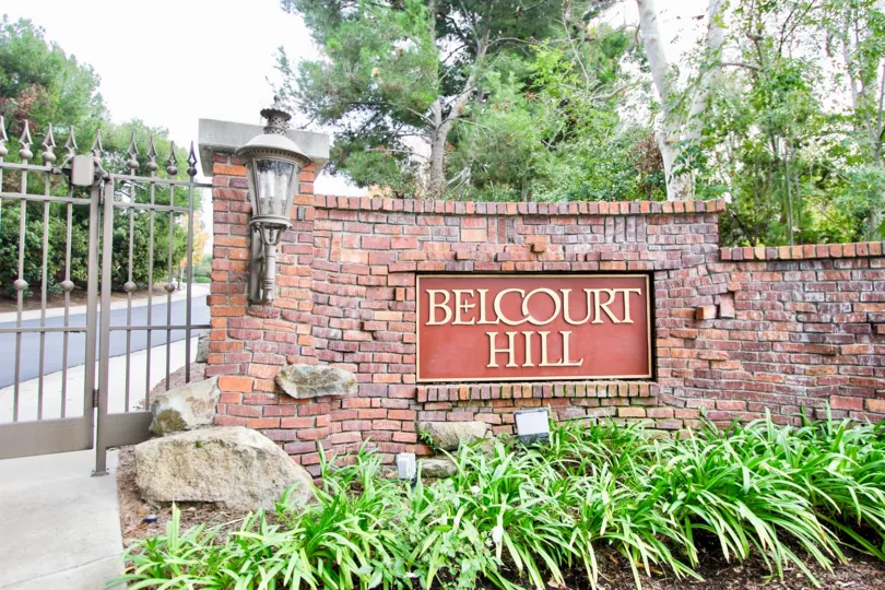 A day in the Belcourt Hill with a metal sign and light.