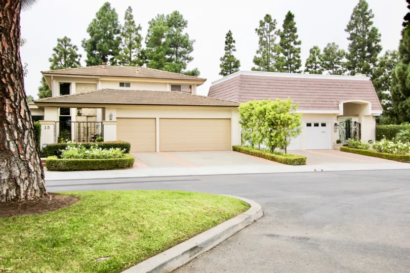 A BEAUTIFUL HOUSE WITH SURROUNDIGN OF GARDEN WITH INFRONT OF TREE