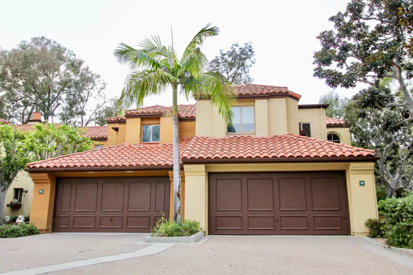 THE 10TH HOUSE IN THE BIG CANYON VILLAS WITH THE TREES, SHUTTERS, PLANTS