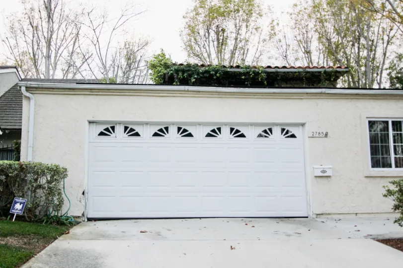An empty driveway at a home in Bluffs Tennis Villas, Newport Beach CA
