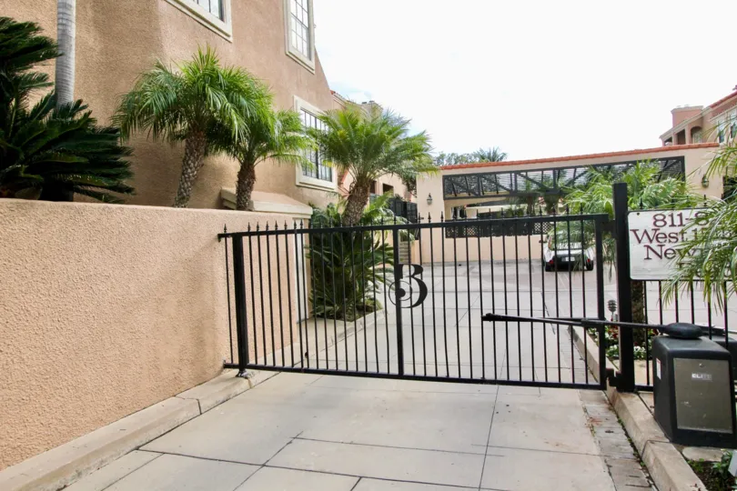 a warm day in the brookview ll with house that has parking car and out way gate