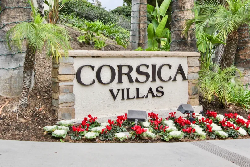 A great day in the Corsica Villas with a sign and lights.