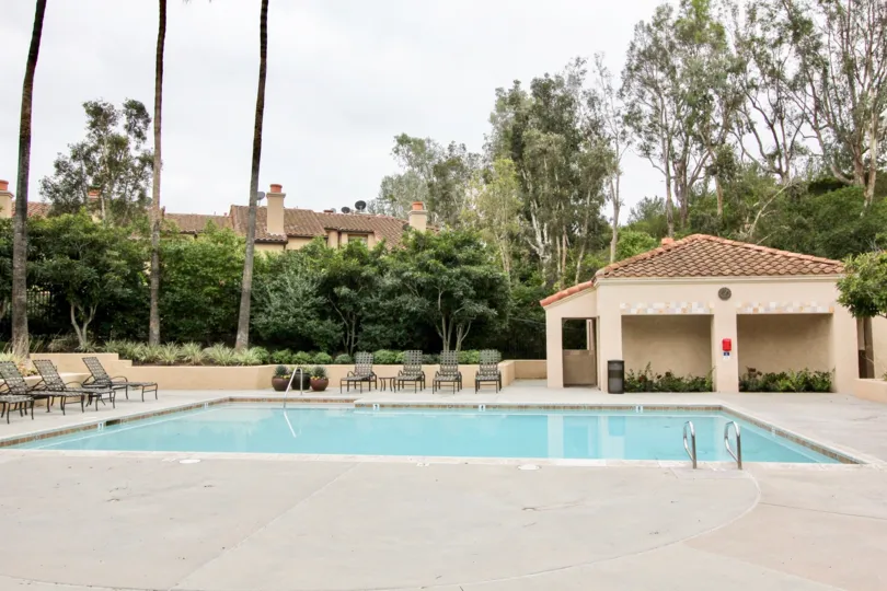 THE SWIMMING POOL IN THE Corsica Villas WITH THE DISH ANTENNAS, CHAIRS
