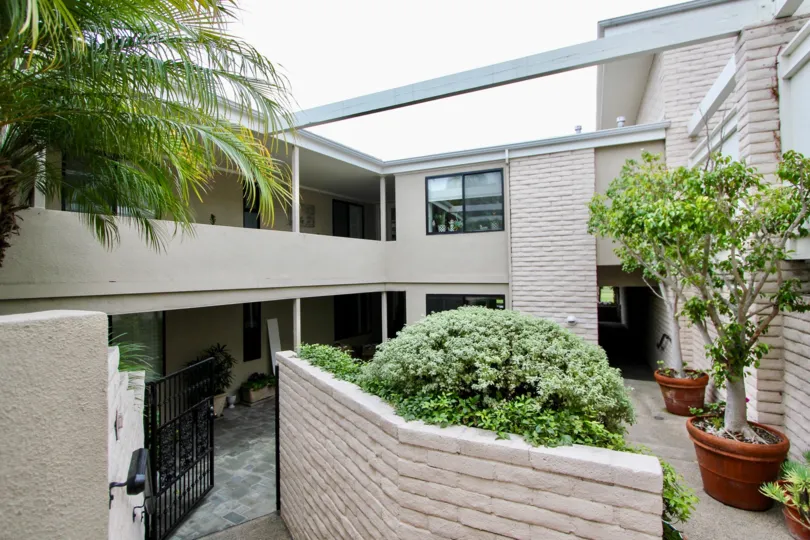 THE HOUSE IN THE GRANVILLE WITH THE FLOWER POT, BALCONIS, PLANTS, GLASS WINDOW