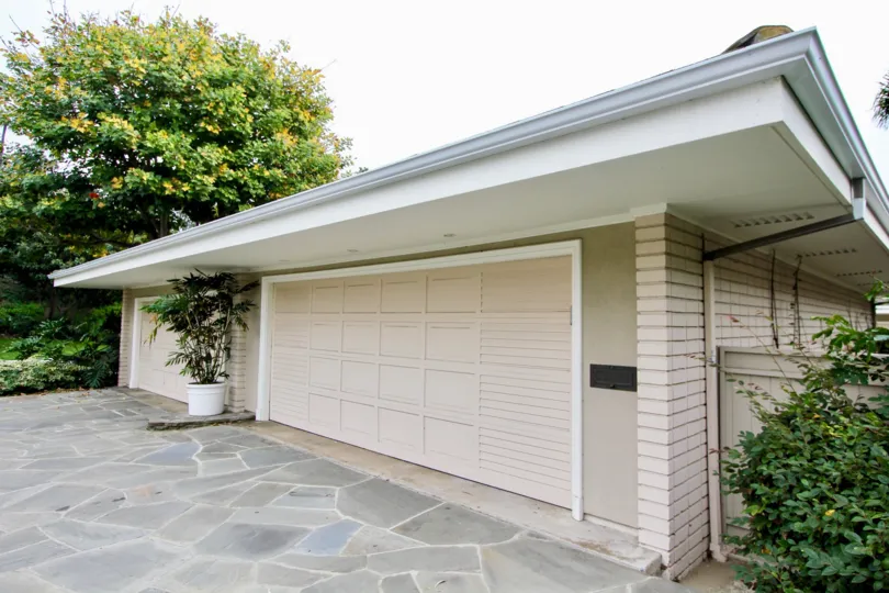 Flower pot is placed between the car shed place in Villa of Granville