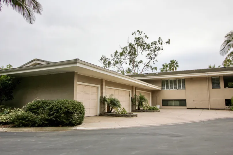 THE HOUSE IN THE GRANVILLE WITH THE ROAD, PLANTS, TREES