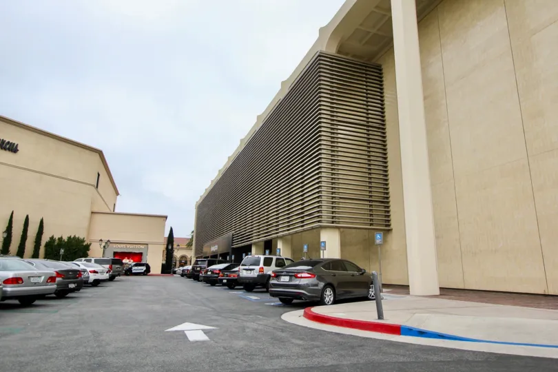 Rear parking lot view at Meridian in Newport Beach, CA