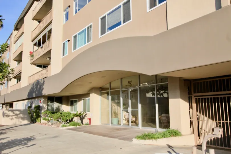 THE 310 BUILDING IN THE NEWPORT BAY TOWERS WITH THE BALCONIS, PLANTS