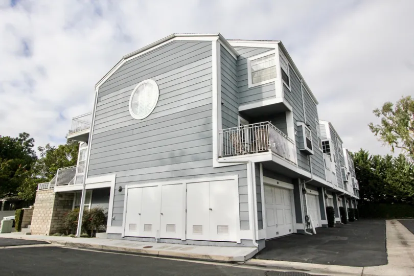 a warm day in the newport knolls with building that has colour of gray and white of circle