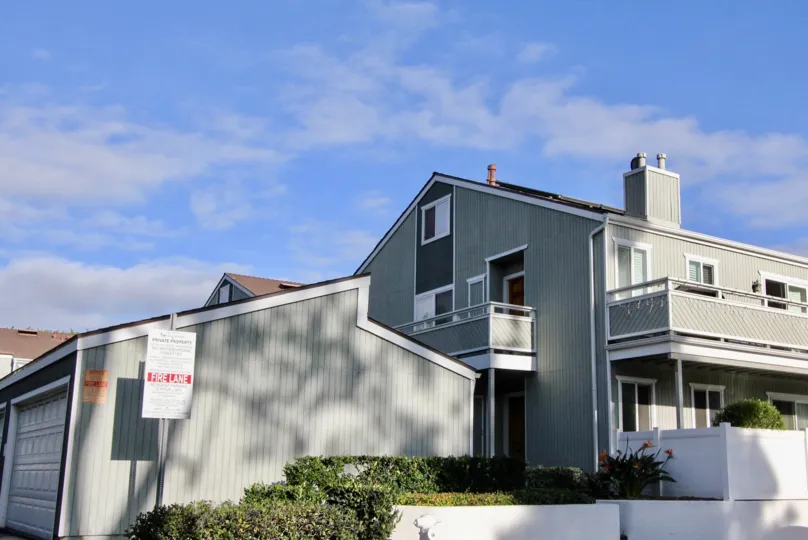 A sunny day in the Seawind with a house and shadows.