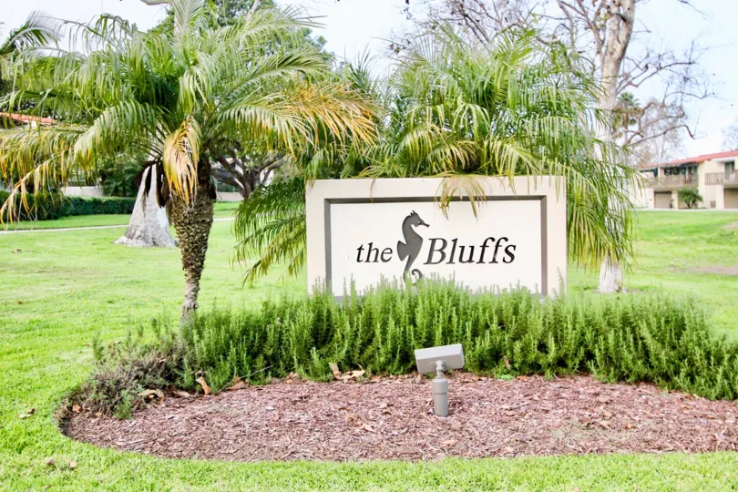 a warm day in the the bluffs with park that has garden around
