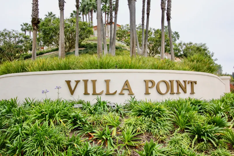 A great day in the Villa Point with a sign on the wall.
