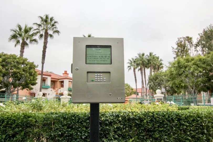 A screen has a message for visitors at Villa Point condos