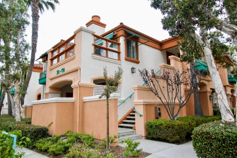 a warm day in the villa point with house that has short steps and garden around