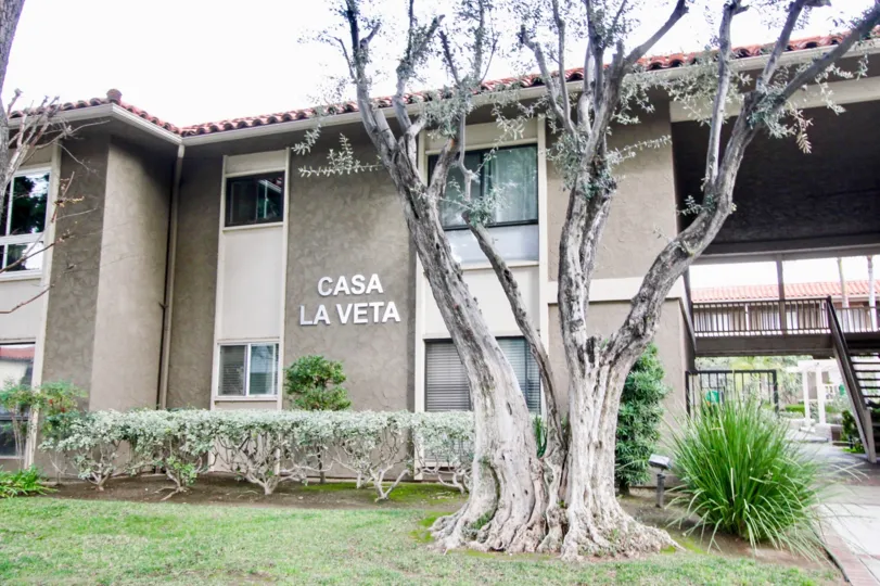 A weloming view of the Casa La Veta apartments in Orange City.
