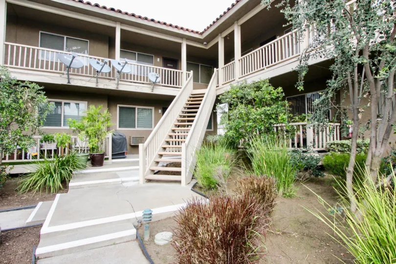 A view of the Casa La Veta property, flush with landscaping, in Orange, CA.