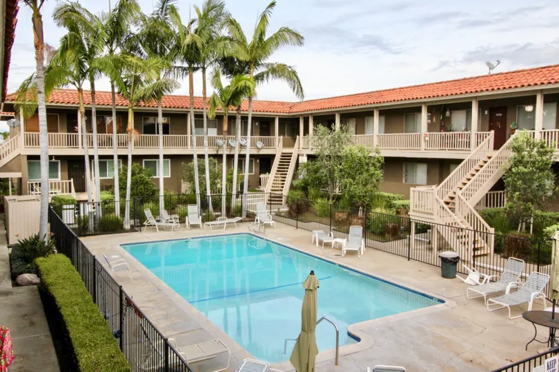 Pool and view of rooms with greenery at Casa Le Veta, Orange CA