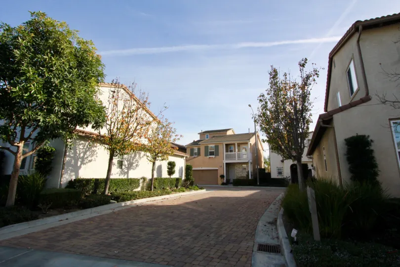 Beautiful neighborhood house with two stories and a lush green front yard