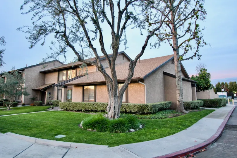 Brown house with trees in Casitas Santiago, Orange California
