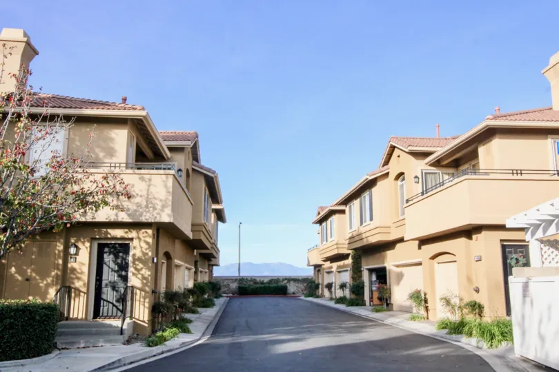 Beautiful neighborhood house with two stories and a lush green front yard