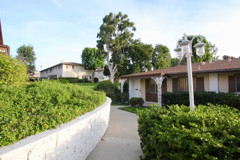 Beautiful neighborhood house with two stories and a lush green front yard