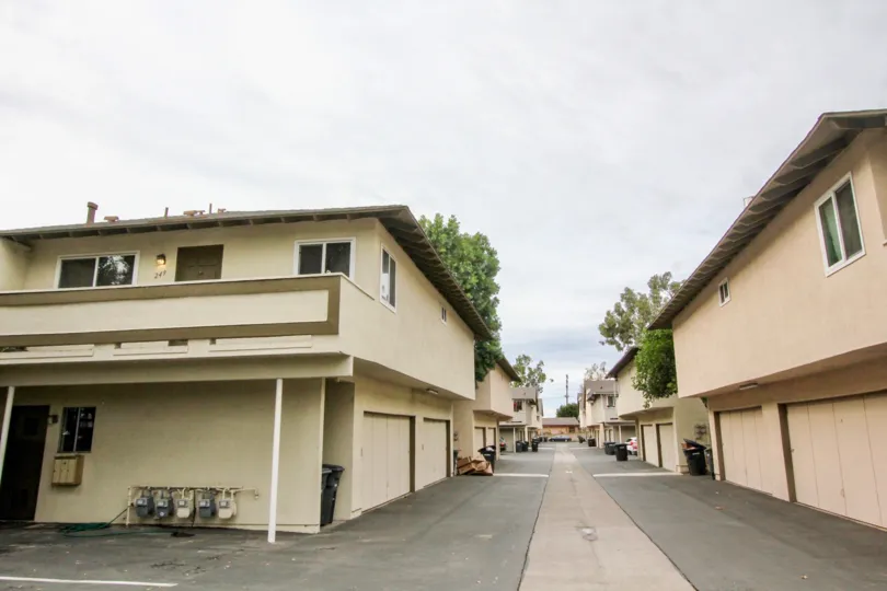 Apartment complex alleyway on a cloudy day in Criterion.