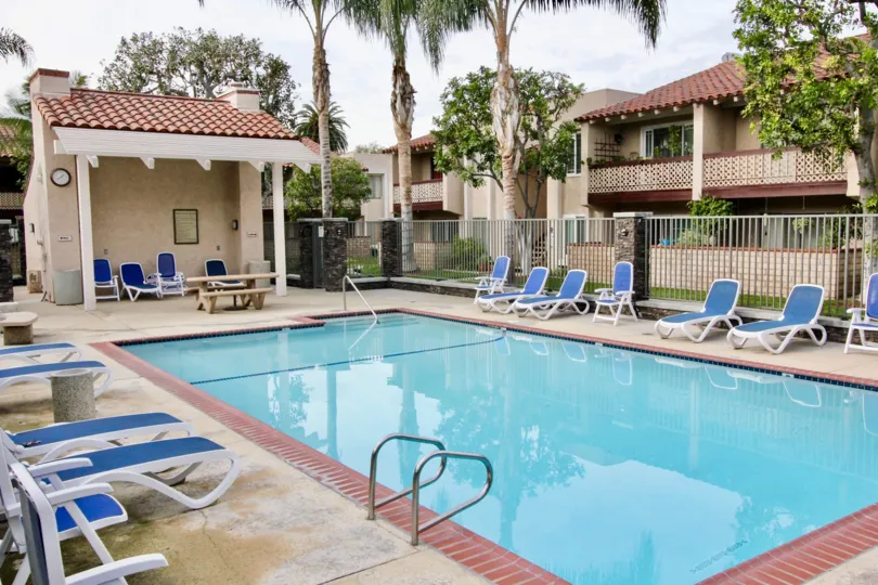 Community pool and lounge chairs in the La Veta Monterey neighborhood
