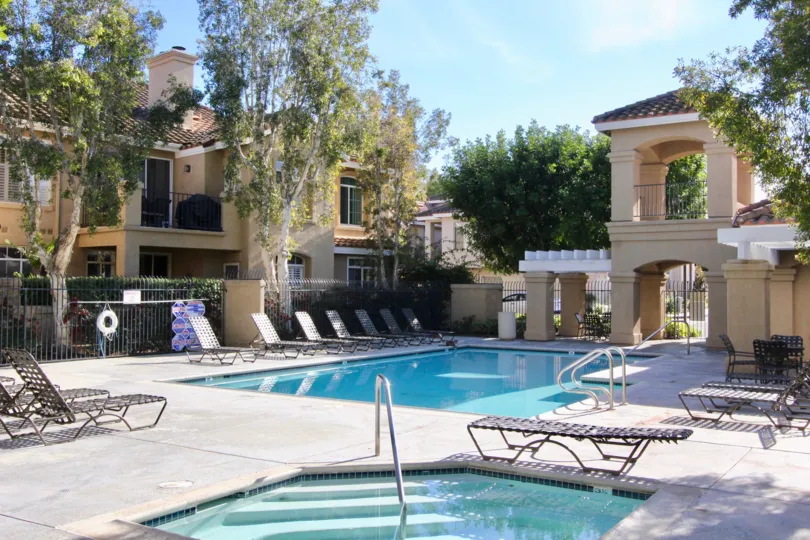 A great day in the Montevista with a swimming pool and chairs.