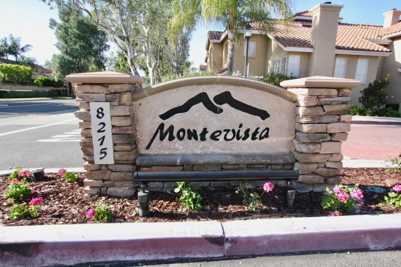 Beautiful landscaping around the welcome sign at the Montevista Community.