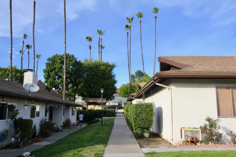 The house in the Park 72 is looking like a elegant homes with trees and plants and also with homes.