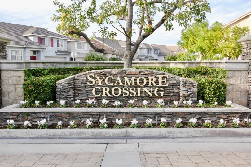 Tidy garden on a sunny day at Sycamore Crossing in Orange California.