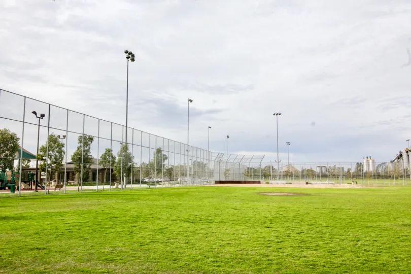 A tall metal chain-link fence in Timber Hill Orange, CA