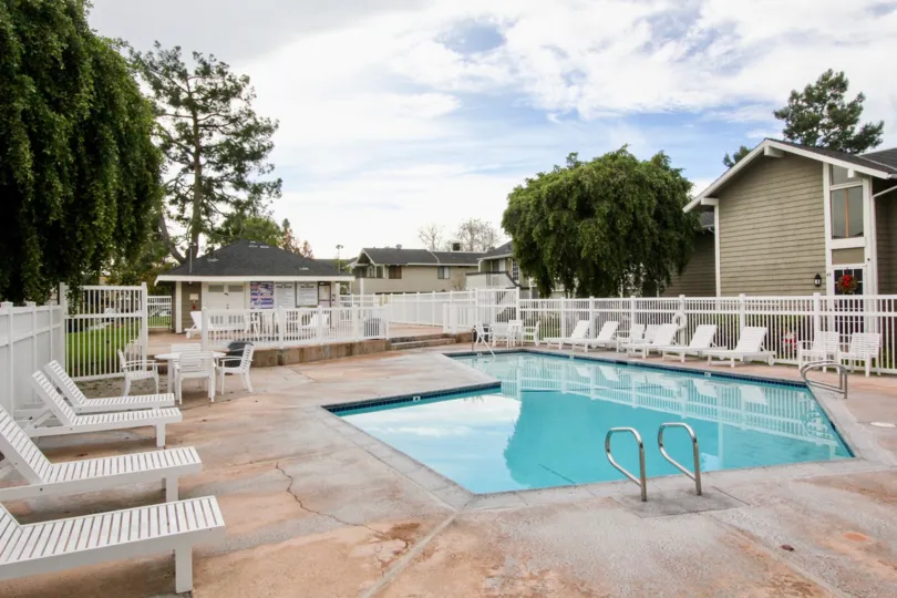 Sideview of one of the swimming pools in Walnut Village community during the afternoon, Orange, CA