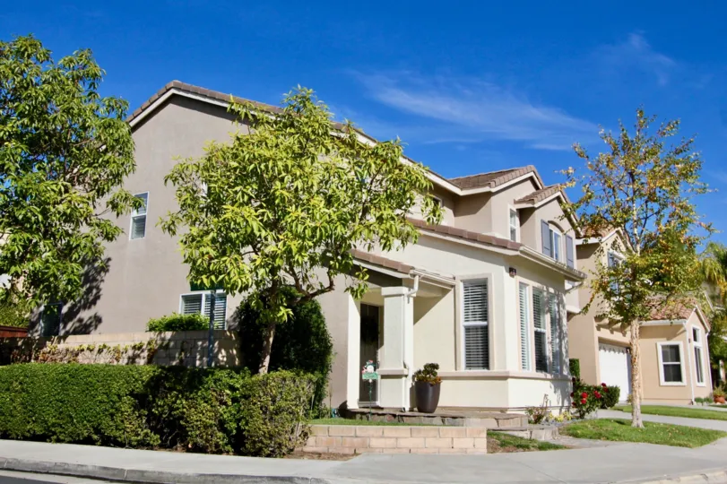 Two-storey townhouses with tile roofing in the Ballantree community.