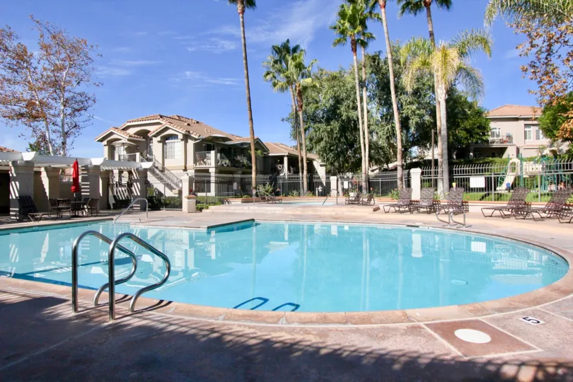 Chairs and pool at Belflora in Rancho Santa Margarita, CA