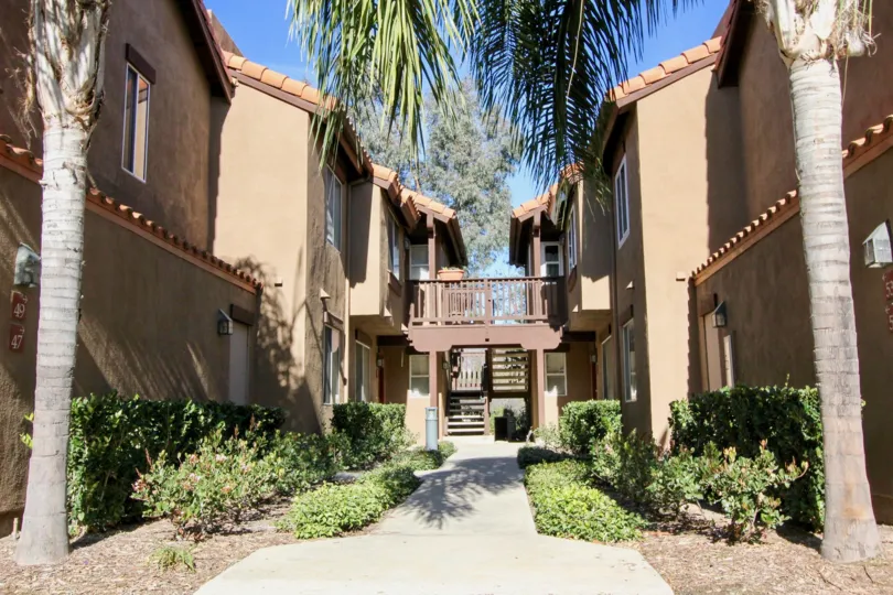 THE 49, 47TH FLATS IN THE BRISA DEL LAGO II WITH THE UPSTAIRS, PLANTS, TREES