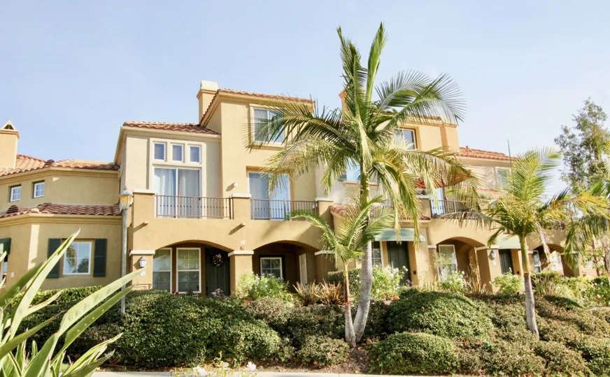 Gorgeous home surrounded by foliage in the Corte Melina neighborhood on a sunny day