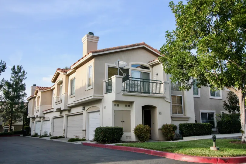 A sunny day in the area of La Ventana, outside, condos, balcony, satelite, trees, garages
